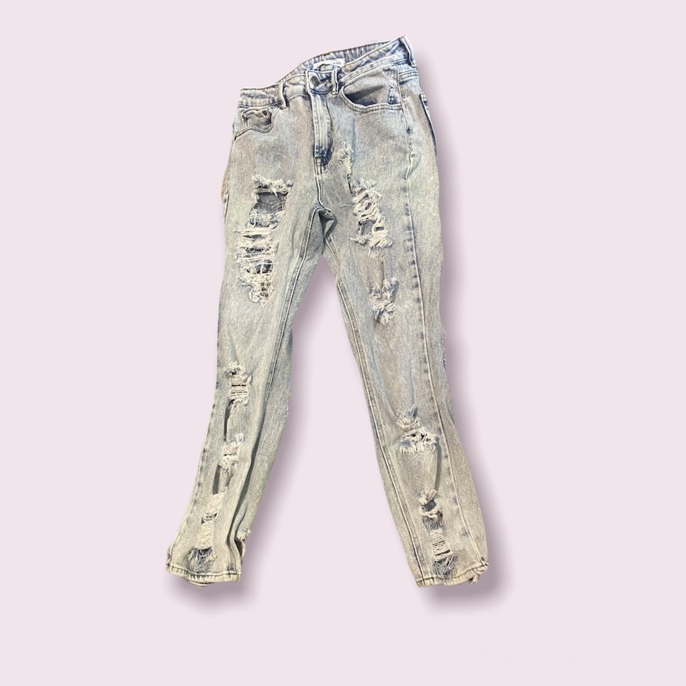 highly distressed light wash jeans